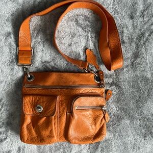 Orange Roots Leather Village Tribe Crossbody Bag